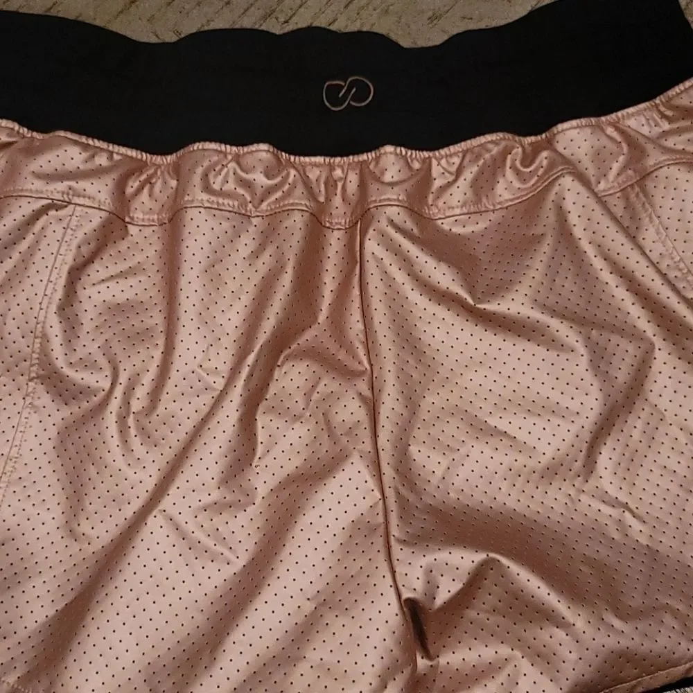 Cala by Carie Underwood 2 in 1 Rose gold shorts XS
